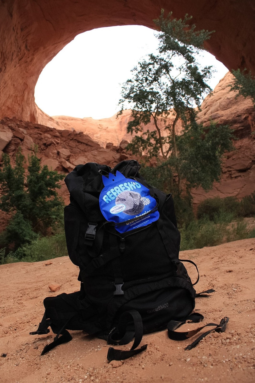 Hike, backpack under the arch, sour freeze-dried blueberries