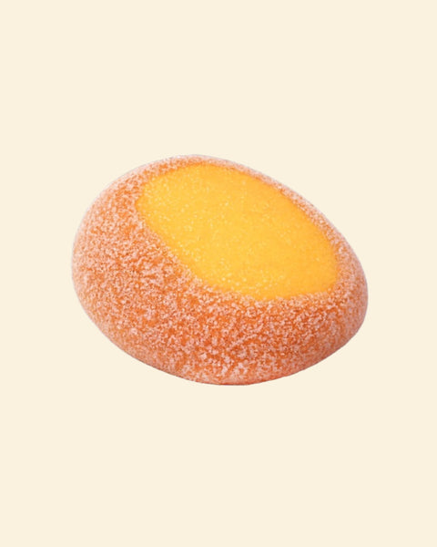 A sugar-crusted sour mango piece.