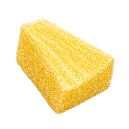 One REFRESH'D freeze-dried sour pineapple, enlarged to show texture.